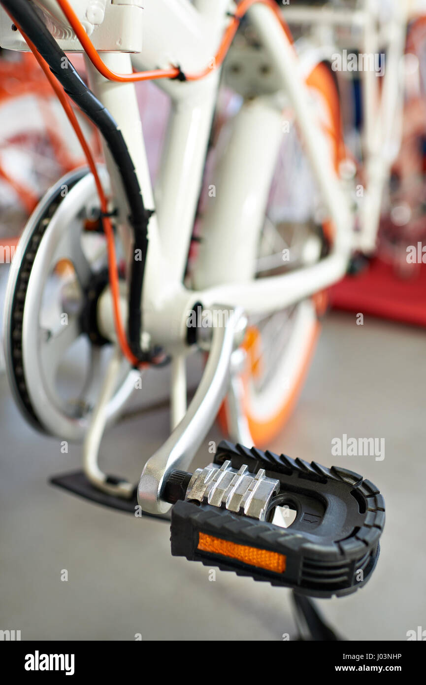 Bicycle pedal closeup on blurred background Stock Photo
