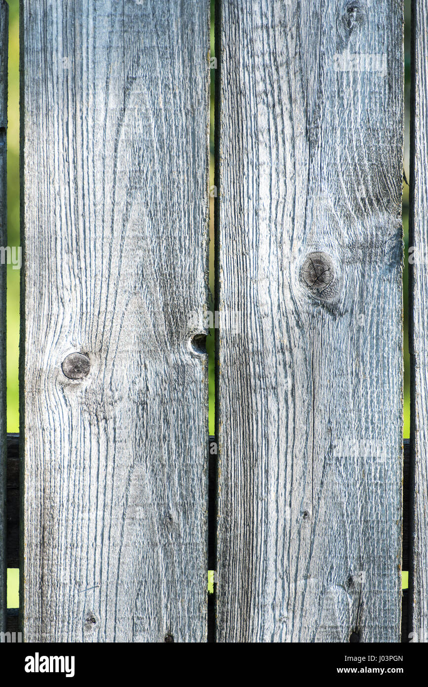 old wooden fence with barbed wire on top Stock Photo - Alamy