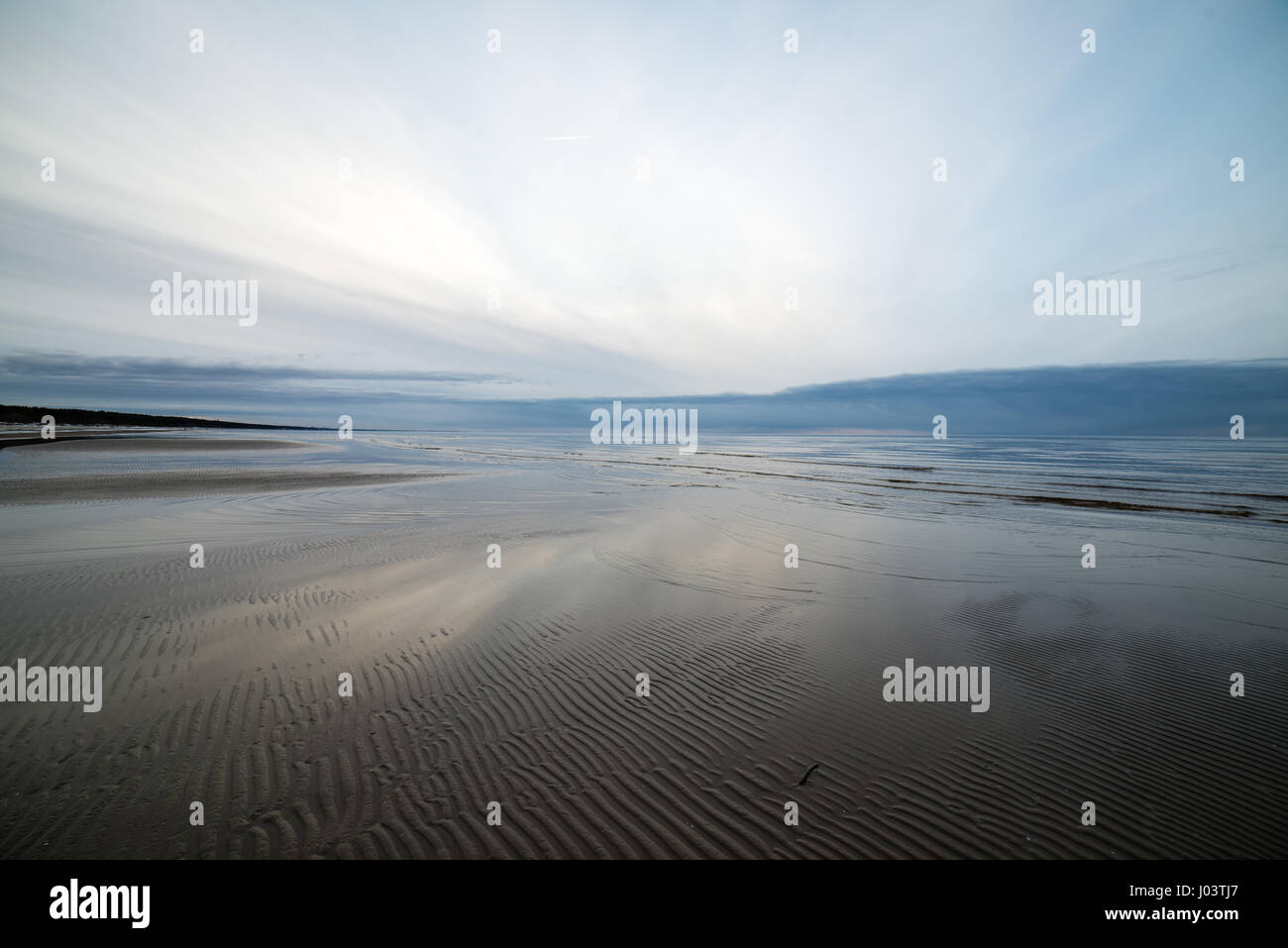 Beautiful calm sunset over the sea. Sunrise in the sea Stock Photo - Alamy