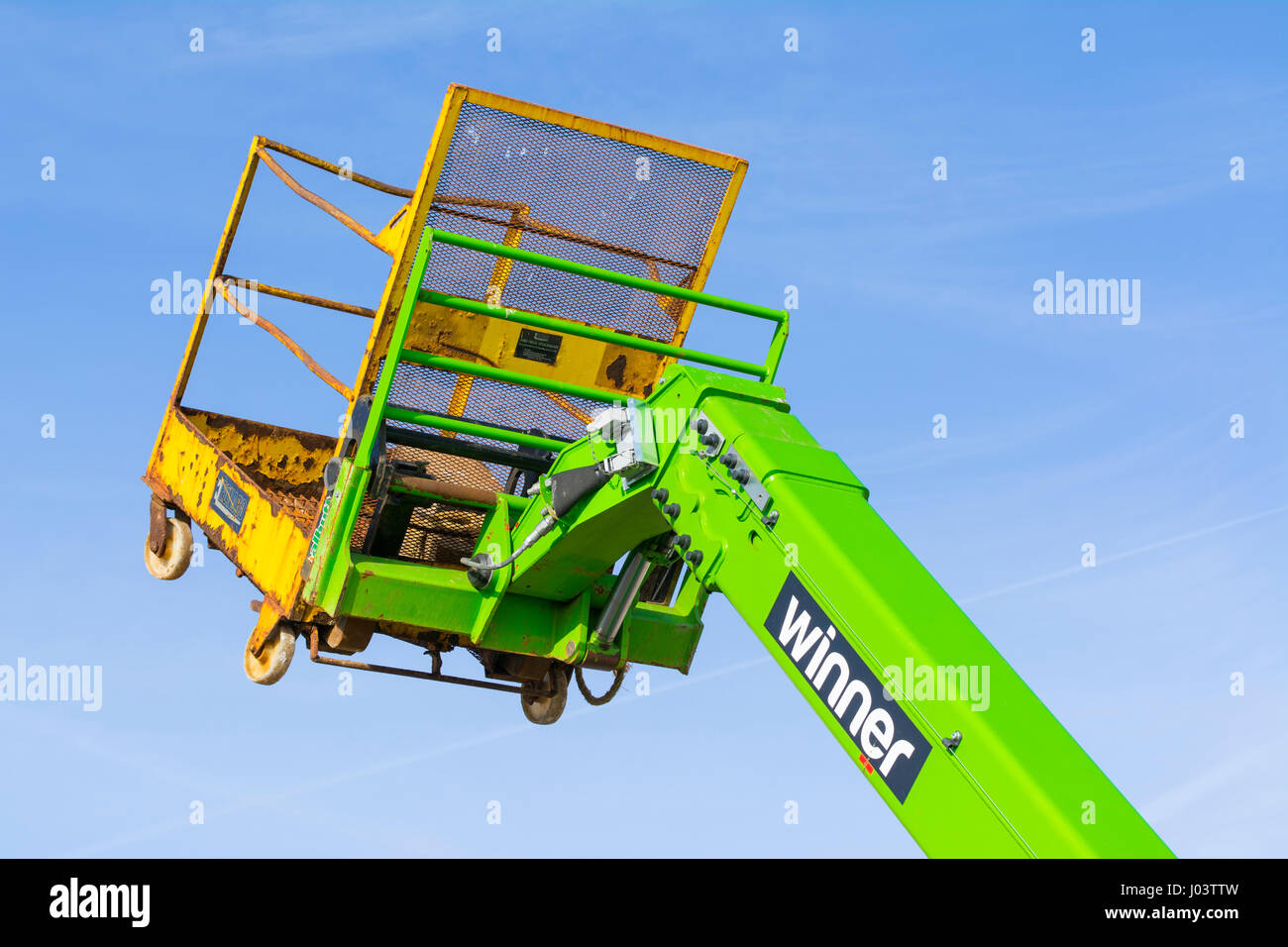 Empty stationary lifting arm of a Winner Access cherry picker construction vehicle. Stock Photo