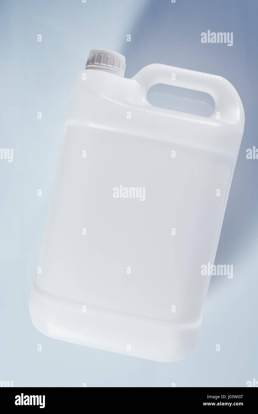 Unlabeled white plastic tank canister chemical liquid container Stock Photo