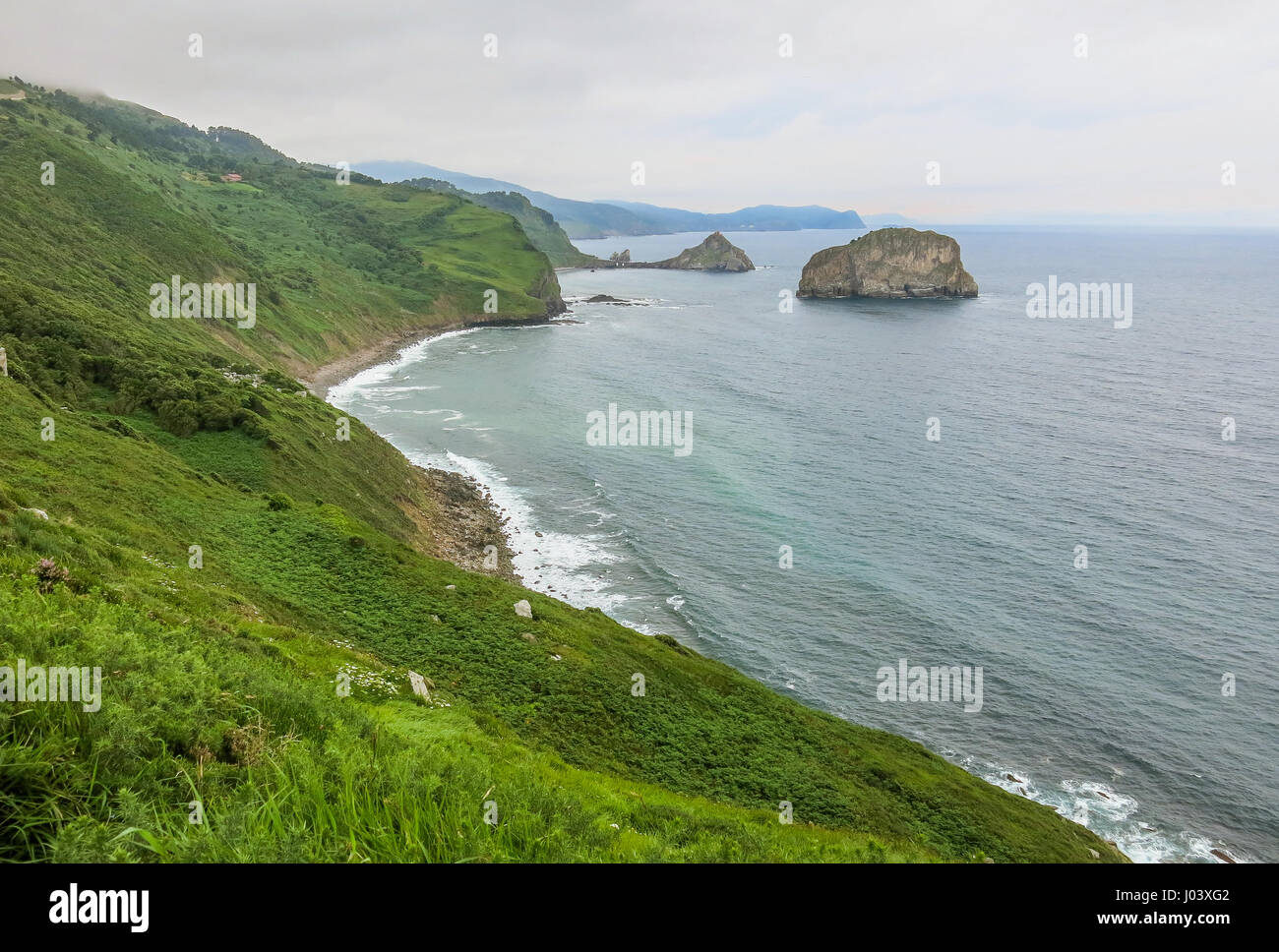 Panoramic view of Basque Country coastline and San Juan de Gaztelugatxe, northern Spain Stock Photo
