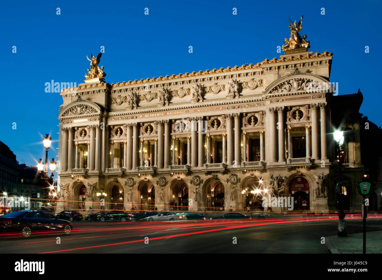 Opera In France France, Paris, Opera Palais Garnier dusk Stock Photo - Alamy