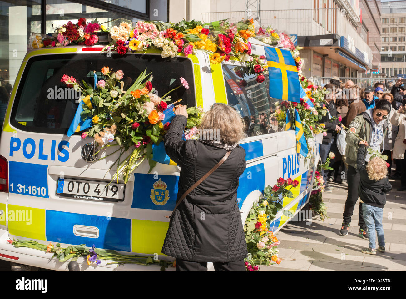 STOCKHOLM, SWEDEN - April 09, 2017: Flowers on a police van. truck attack  in central Stockholm, Sweden Stock Photo - Alamy