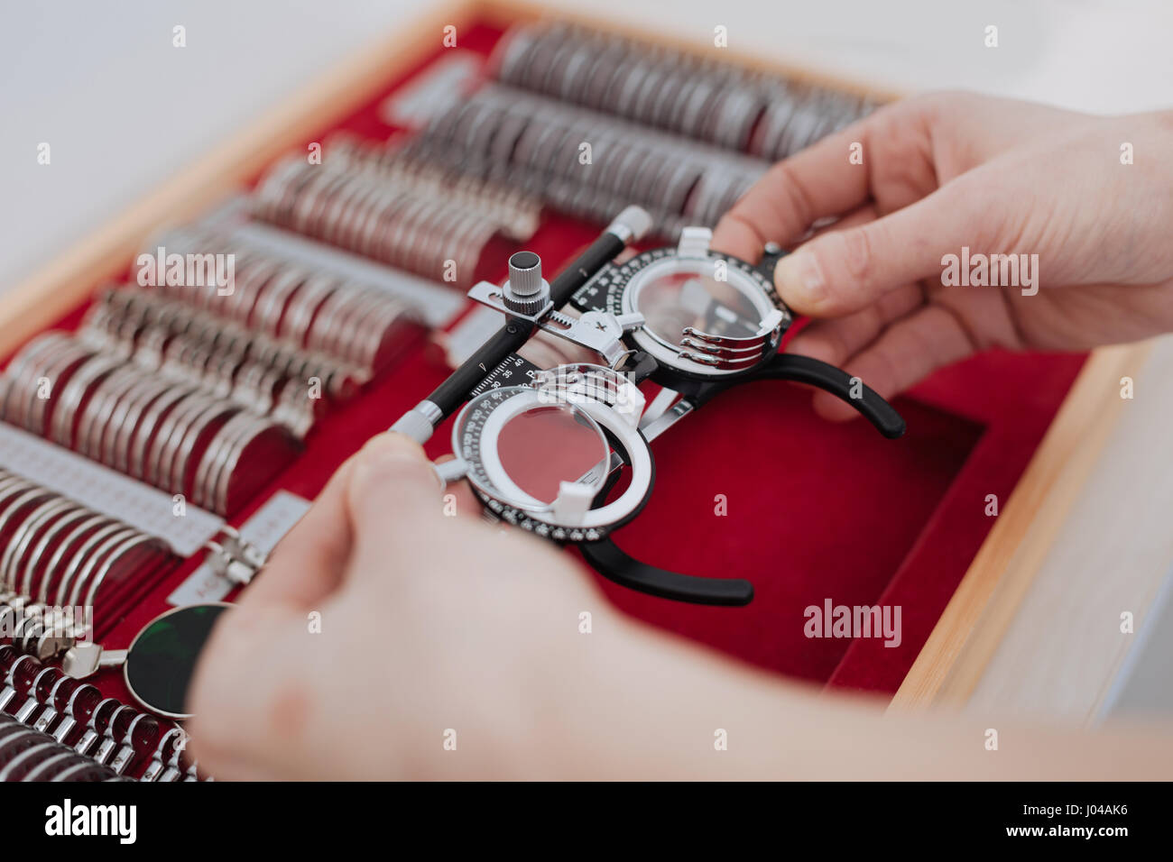 Eye examination glasses being taken out of the box Stock Photo Alamy