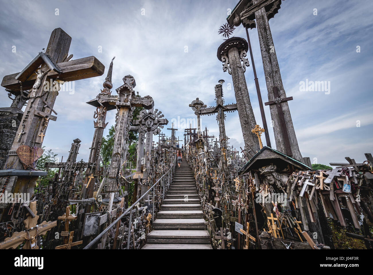 Wooden crosses and stairs to the top of Hill of Crosses in Lithuania Stock Photo