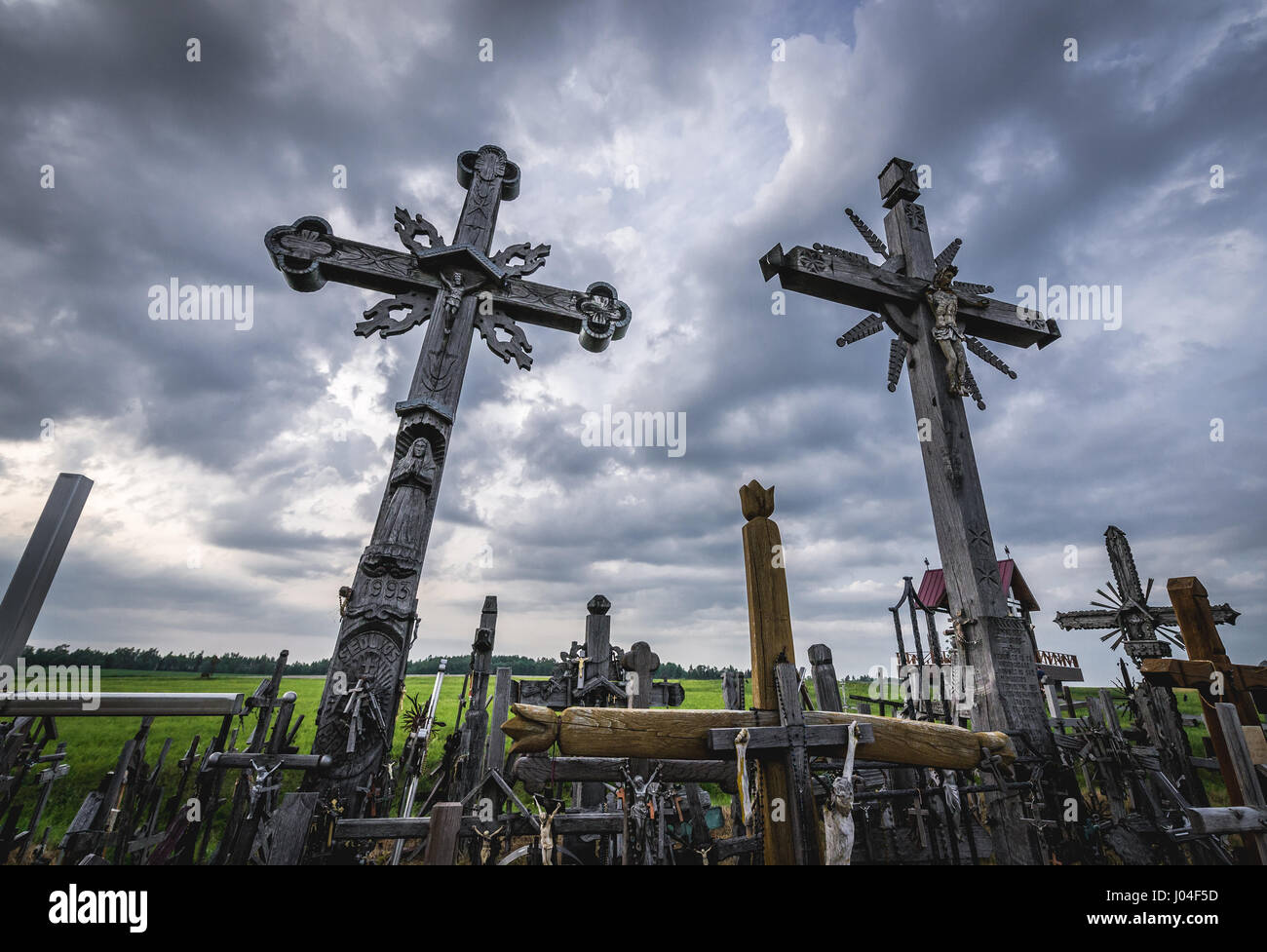 Large wooden crosses on Hill of Crosses in Lithuania Stock Photo