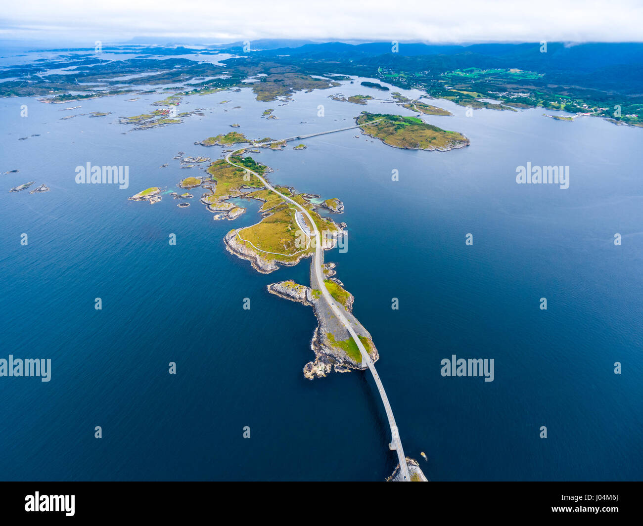 Atlantic Ocean Road or the Atlantic Road (Atlanterhavsveien) been awarded the title as 'Norwegian Construction of the Century'. The road classified as Stock Photo