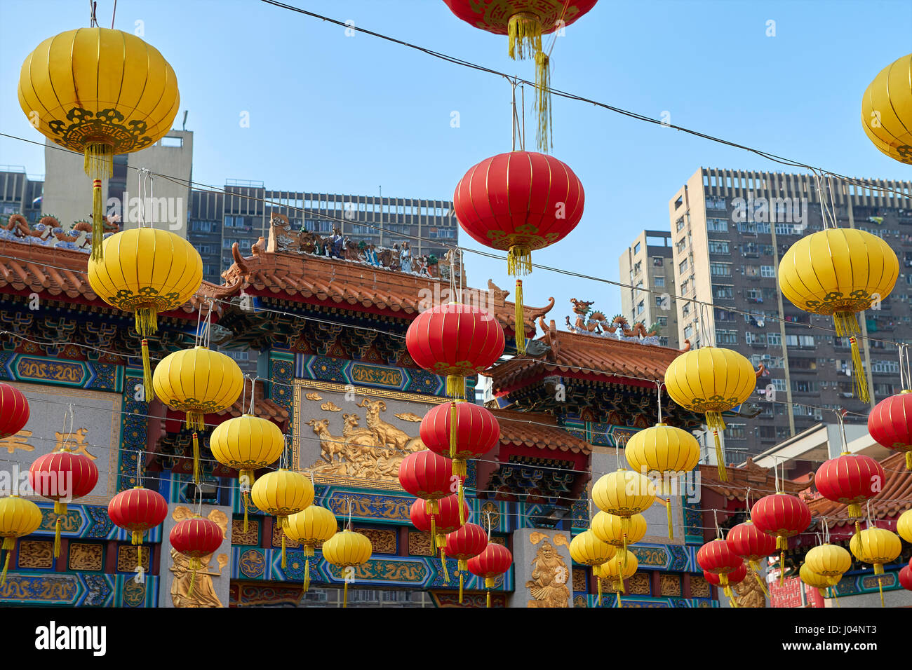 Traditional Chinese Paper Lanterns Hang Over The Wong Tai Sin Temple, Hong Kong. Stock Photo