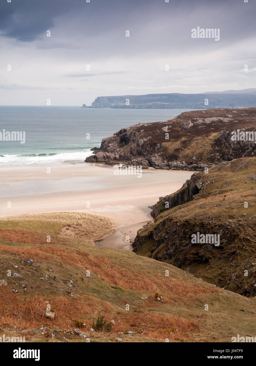 Ceannabeinne, 'the end of the mountains', traditionally known as Traigh Allt Chailgeag – the beach of the burn of bereavement and death. The sandy bea Stock Photo