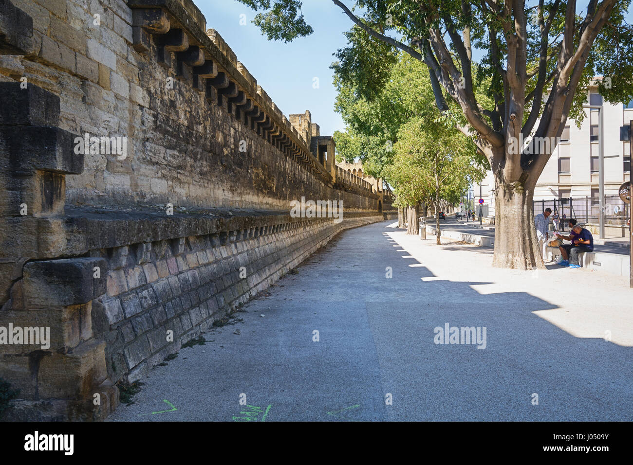 Avignon, France, September 9, 2015: The historic center of Avignon in France  is surrounded by a high city wall Stock Photo