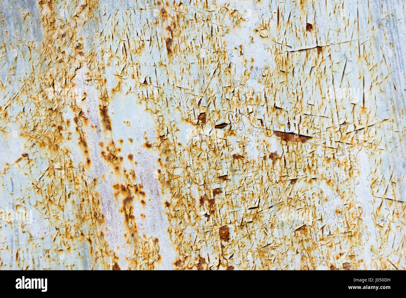 Peeling rusty metal texture Stock Photo