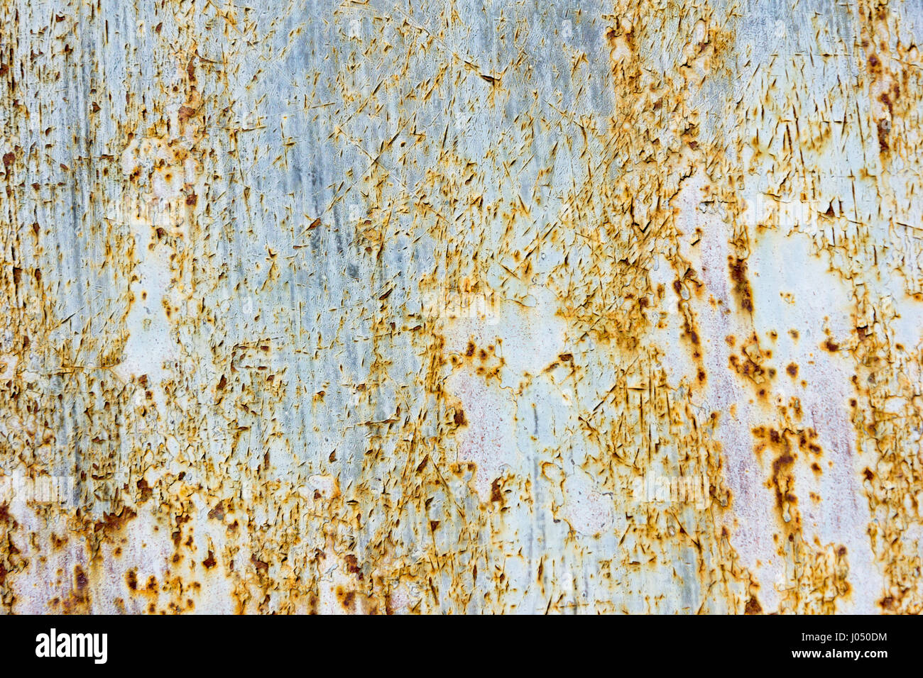 Peeling rusty metal texture Stock Photo