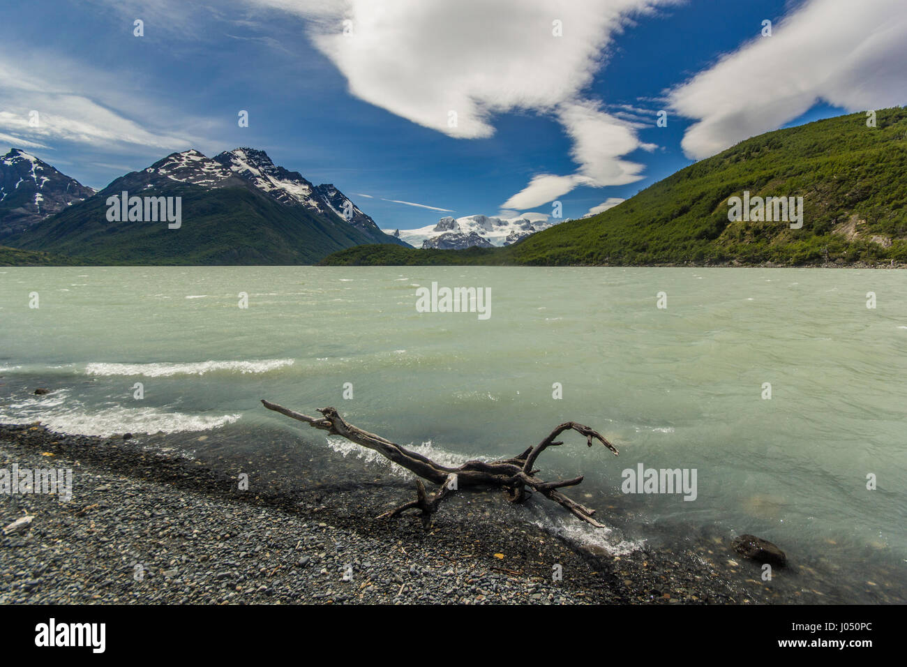 grey dickson lake in patagonia mountains with beautiful huge lenticular