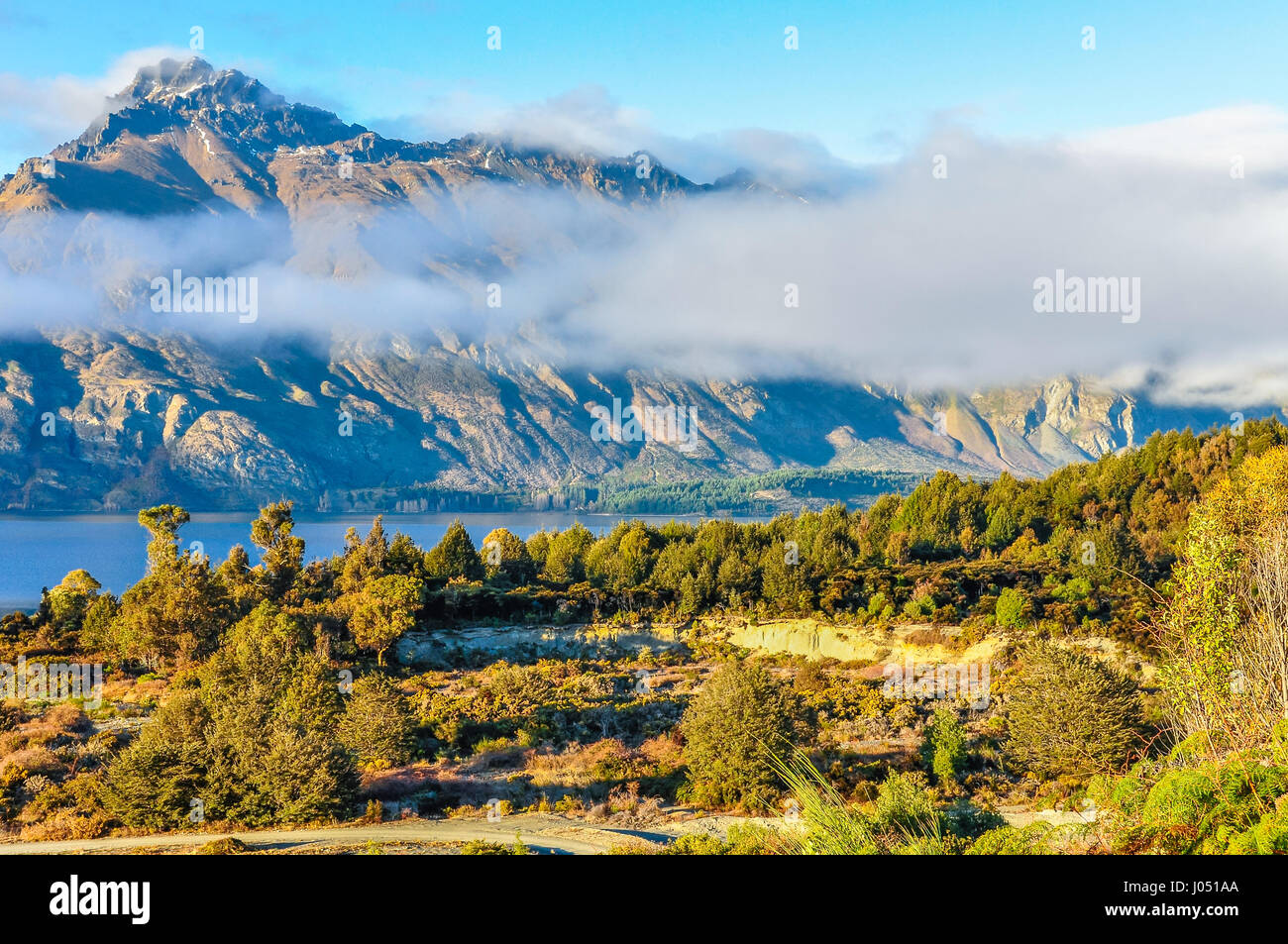Low clouds in the mountains in Lord of the Rings film location, Glenorchy, New Zealand Stock Photo