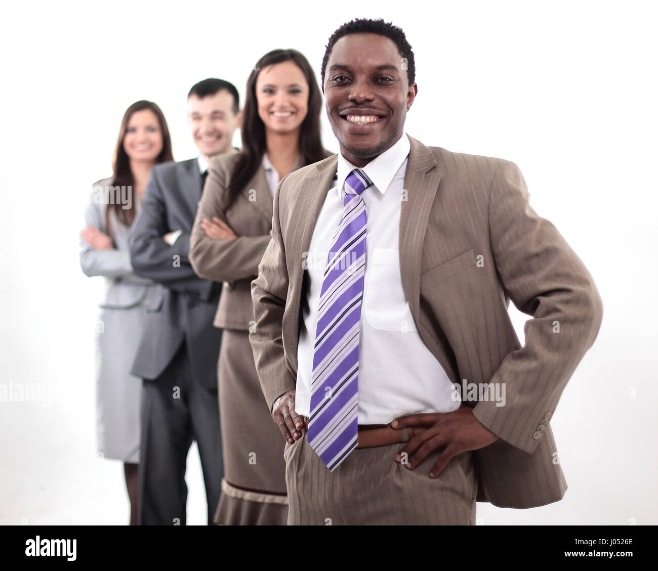Business people standing in a row looking at camera Stock Photo - Alamy