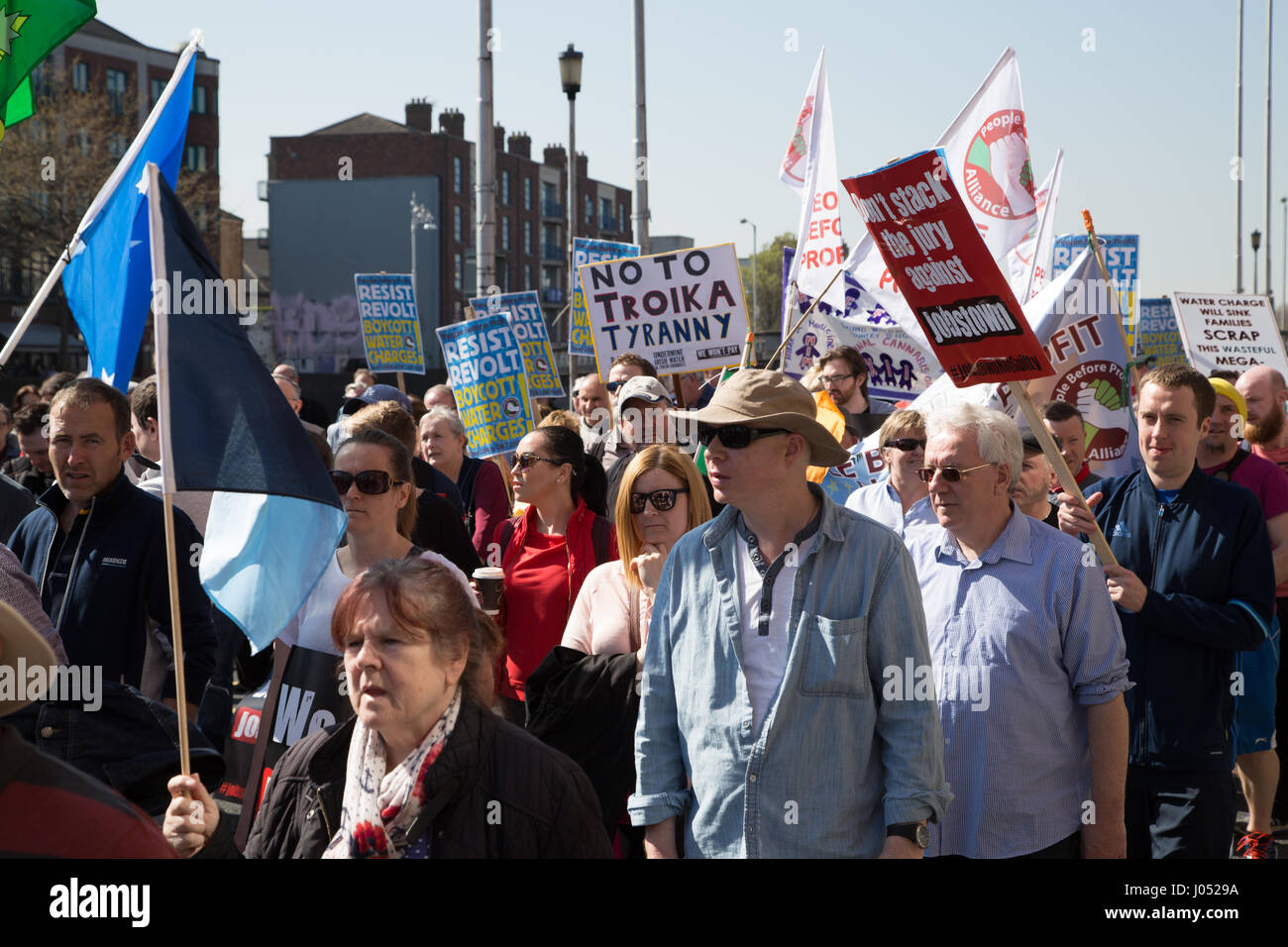 Anti-austerity protestors march through Dublin city, Ireland. Stock Photo
