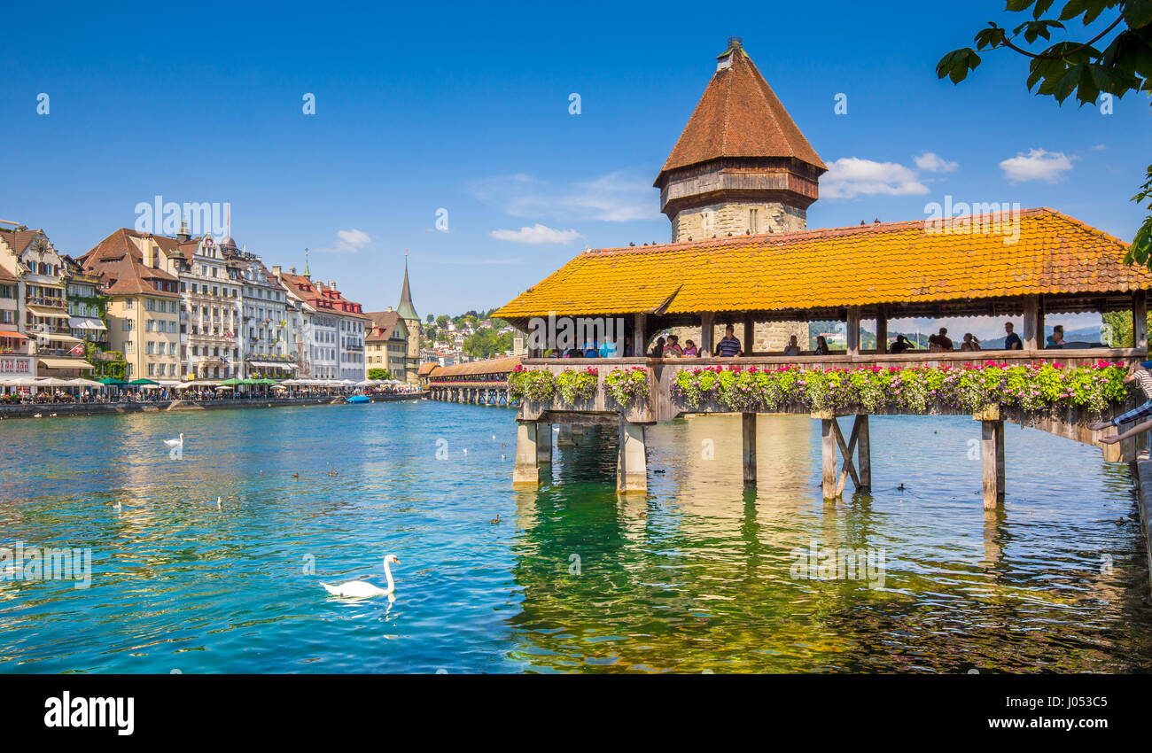 Historic city center of Lucerne with famous Chapel Bridge, the city's symbol and one of the Switzerland's main tourist attractions in summer Stock Photo