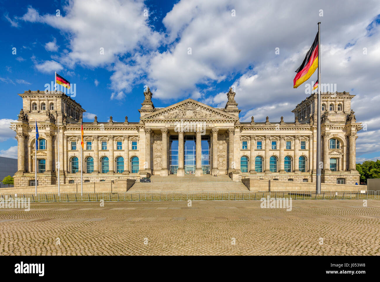 Panoramic view of famous Reichstag building, seat of the German Parliament (Deutscher Bundestag), in beautiful golden evening light at sunset, Berlin Stock Photo