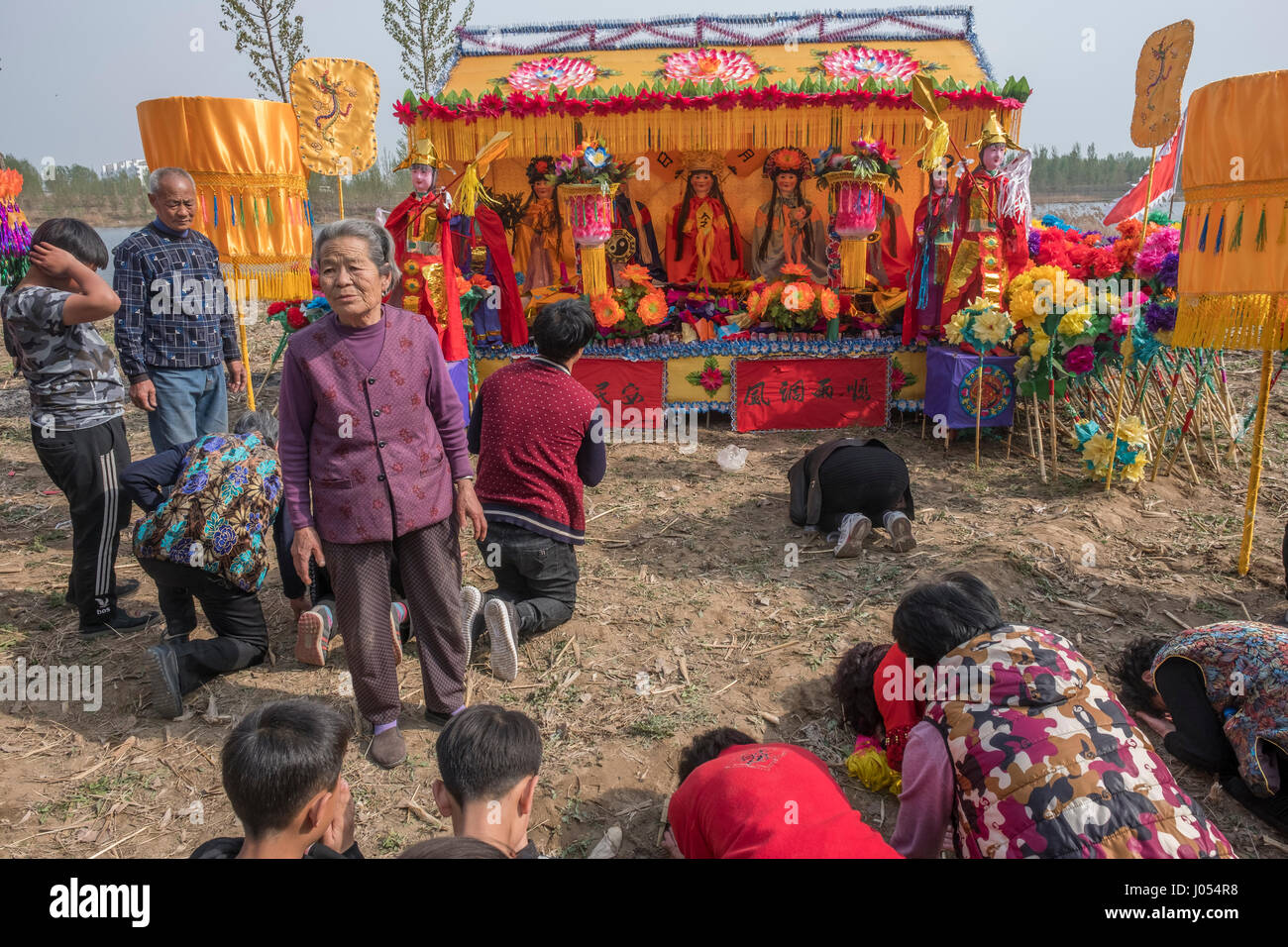 Local villagers attend an annual Taoism ceremony to celebrate the birthday of Bixia Yuanjun, known as the 'Lady of Mount Tai”, one of the most important Taoism goddesses in Northern China, in Liutong village, Rongcheng county, one of the three counties composing Xiongan New Area in Hebei Province, China on April 09, 2017. With Chinese government suddenly announced the location of the special economic zone (SEZ) which would effectively serve as an extension of capital Beijing one week ago, such ceremony of Liutong maybe the last one. Credit: Lou Linwei/Alamy Live News Stock Photo