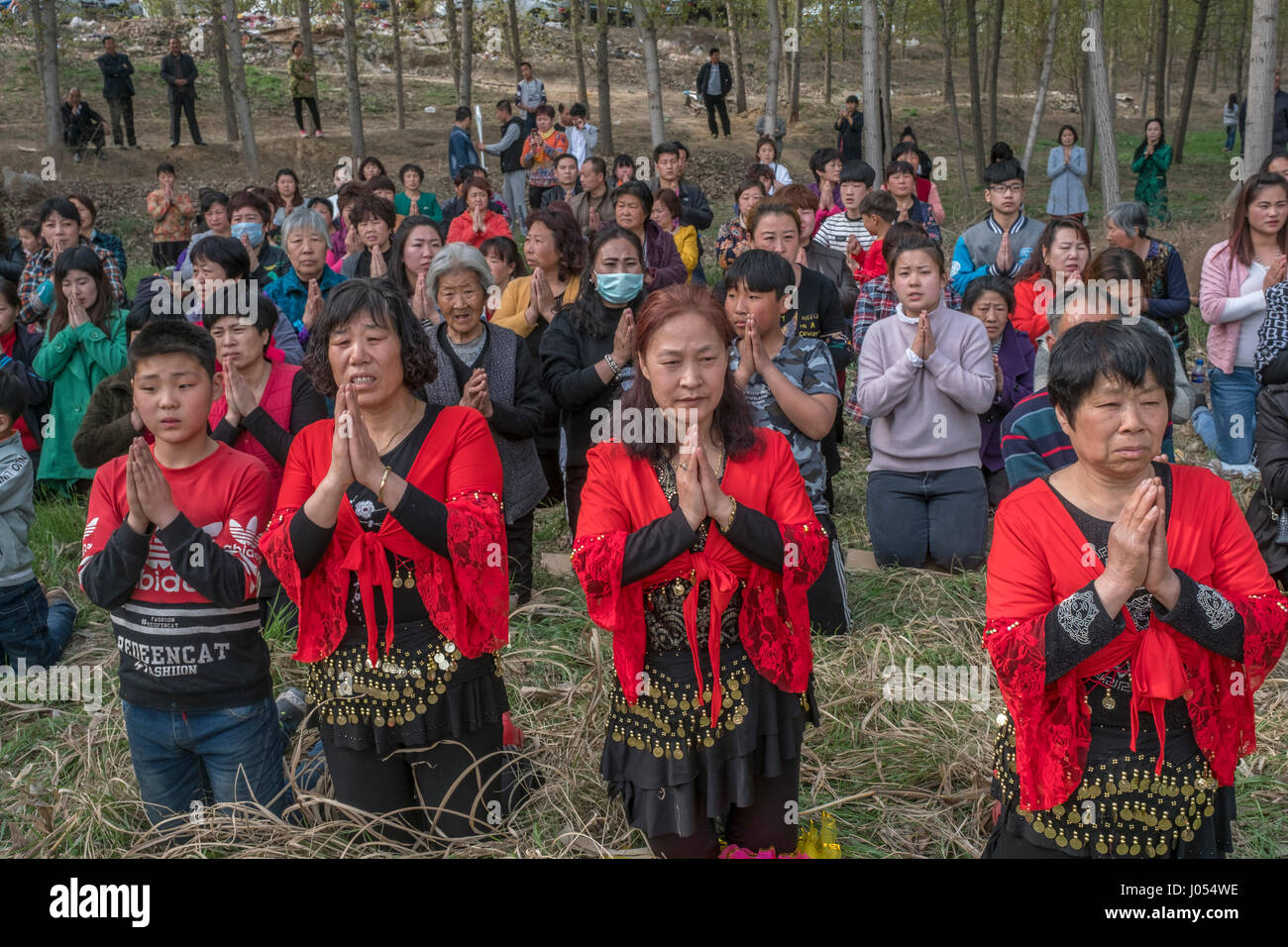 Local villagers vow while attending an annual Taoism ceremony to celebrate the birthday of Bixia Yuanjun, known as the 'Lady of Mount Tai”, one of the most important Taoism goddesses in Northern China, in Liutong village, Rongcheng county, one of the three counties composing Xiongan New Area in Hebei Province, China on April 09, 2017. With Chinese government suddenly announced the location of the special economic zone (SEZ) which would effectively serve as an extension of capital Beijing one week ago, such ceremony of Liutong maybe the last one. Credit: Lou Linwei/Alamy Live News Stock Photo