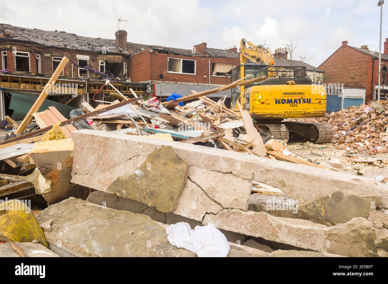 New Ferry, Wirral, UK. 10th April, 2017. The scene of the recent massive gas explosion has now been handed over from Merseyside Police to WIrral Borough Council.  The cleanup operation commences and, for the first time, residents and business owners are being allowed into the area to retrieve belongings, of which a great many clothes and personal effects are strewn across the scene.  The damage is so great, that a lot of the buildings will need to be demolished and rebuilt. © Paul Warburton Stock Photo