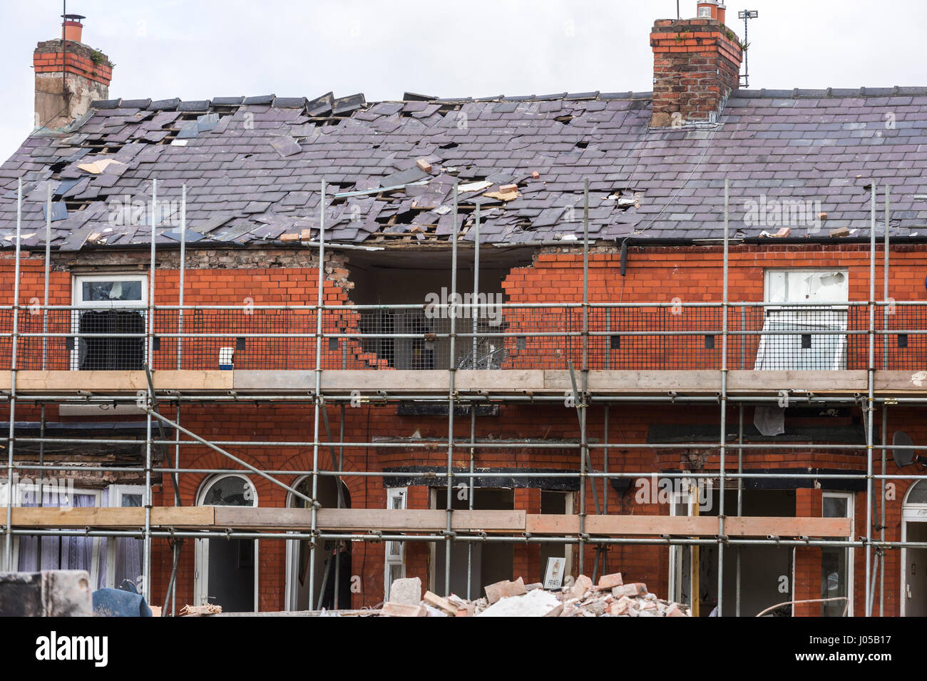 New Ferry, Wirral, UK. 10th April, 2017. The scene of the recent massive gas explosion has now been handed over from Merseyside Police to WIrral Borough Council.  The cleanup operation commences and, for the first time, residents and business owners are being allowed into the area to retrieve belongings, of which a great many clothes and personal effects are strewn across the scene.  The damage is so great, that a lot of the buildings will need to be demolished and rebuilt. © Paul Warburton Stock Photo