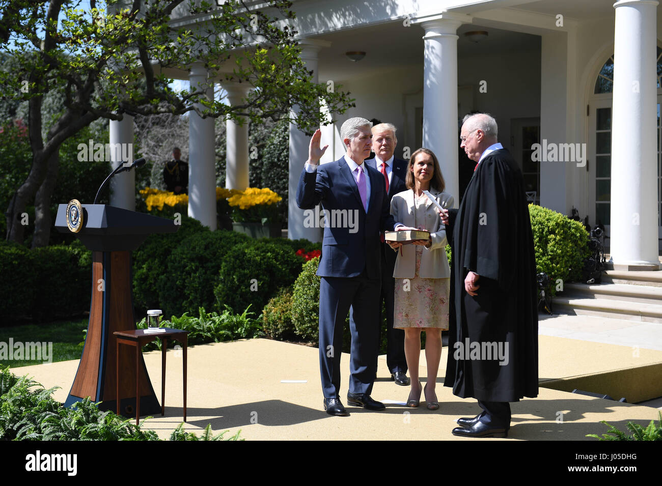 Washington, USA. 10th Apr, 2017. Neil Gorsuch (1st L) attends the swearing-in ceremony as the newest member of the U.S. Supreme Court at the White House in Washington, DC, the United States, on April 10, 2017. Neil Gorsuch on Monday was sworn in as the newest member of the U.S. Supreme Court, adding a conservative shade to the judicial body that will soon rule on a number of divisive issues including voting and gun rights. Credit: Yin Bogu/Xinhua/Alamy Live News Stock Photo