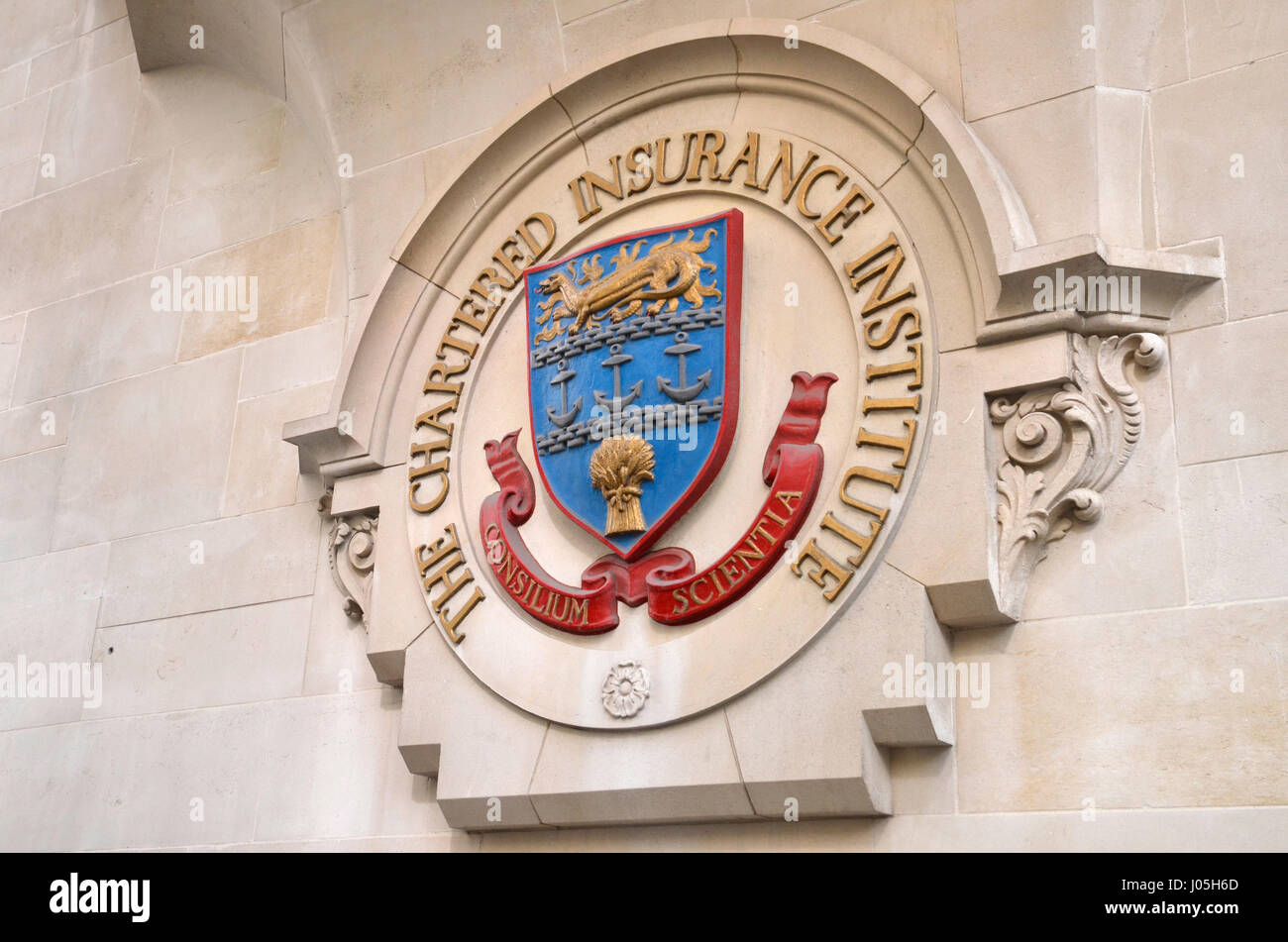 The emblem of the Chartered Insurance Institute in Aldermanbury, City of London Stock Photo