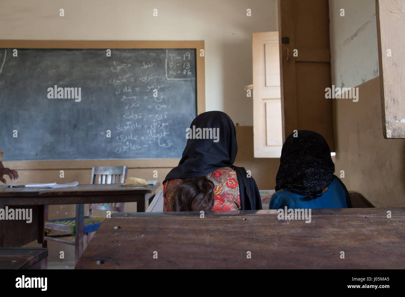 Girls studying in a government school in Pakistan Stock Photo