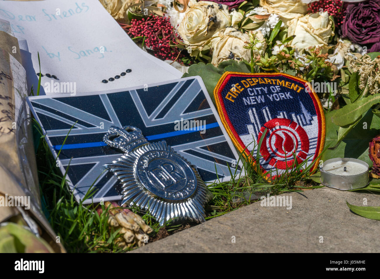 Floral Tributes, placed outside the Palace of Westminster, to the victims of the Westminster attack  by Khalid Masood who ran down pedestrians on West Stock Photo