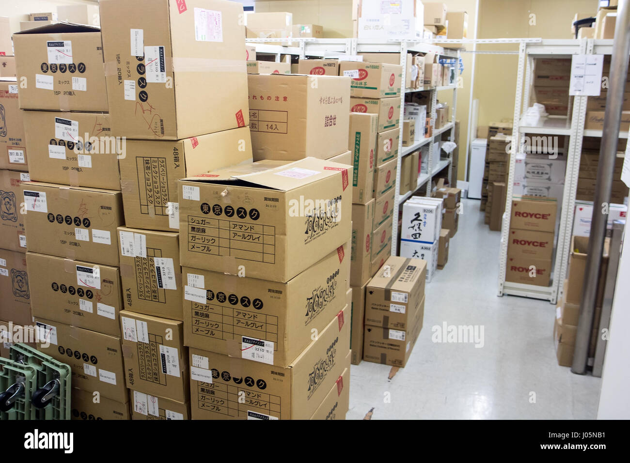 Cardboard boxes in a warehouse store. Storage of goods on the shelves