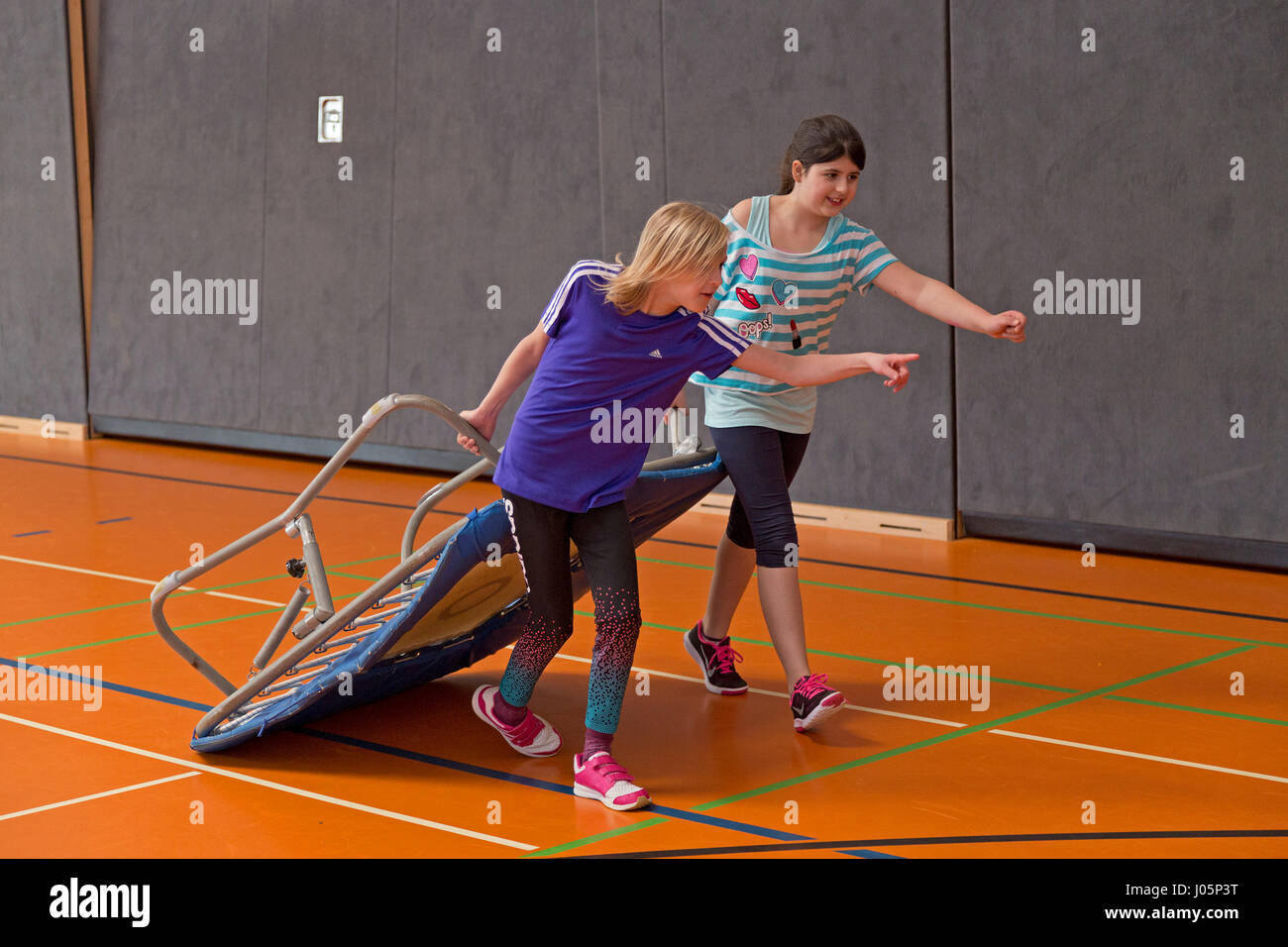 girls at physical education at primary school, Lower Saxony, Germany Stock Photo