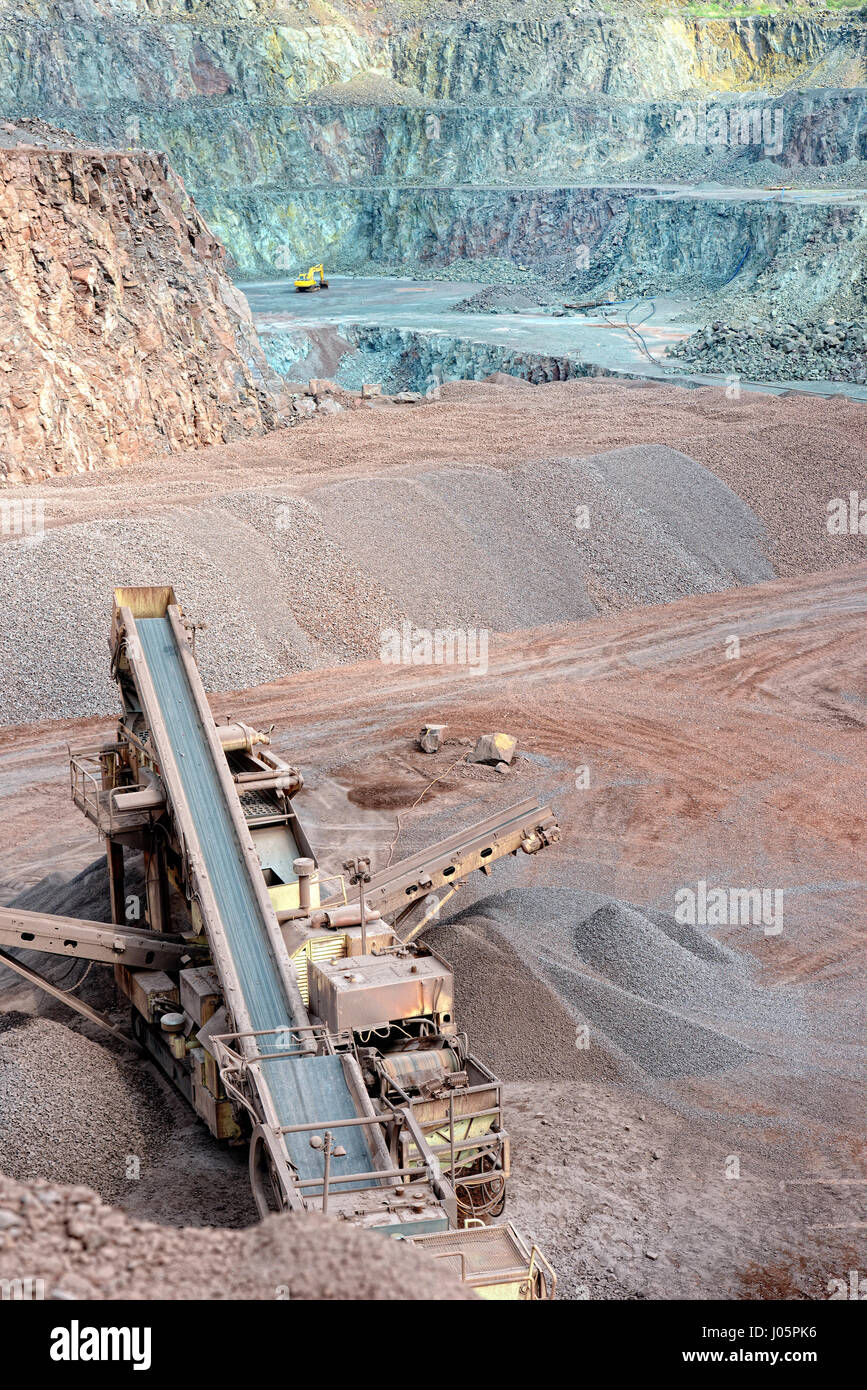 https://c8.alamy.com/comp/J05PK6/stone-crusher-in-a-quarry-mining-industry-J05PK6.jpg