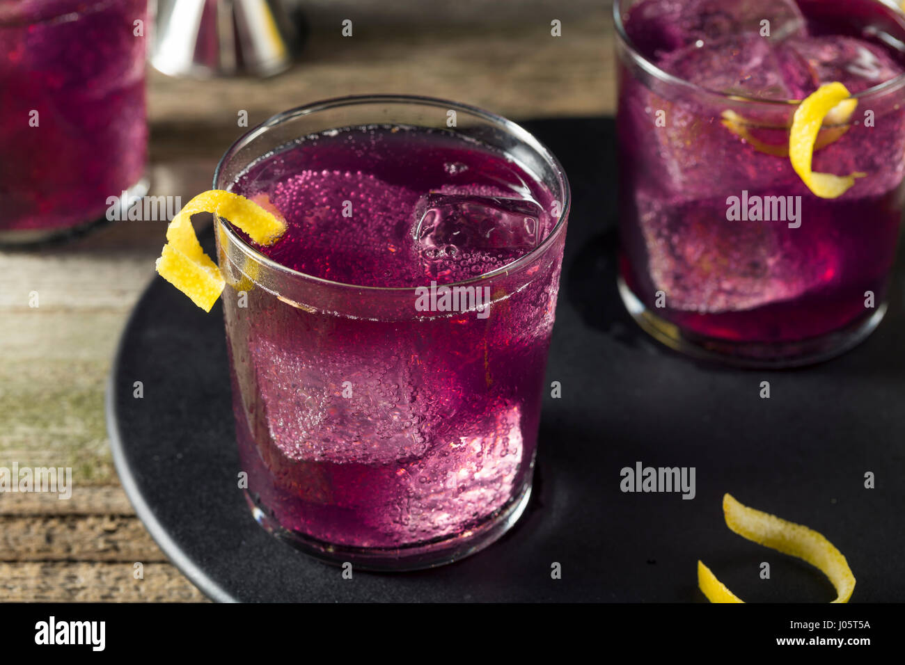 Homemade Purple Haze Cocktail with a Lemon Garnish Stock Photo Alamy