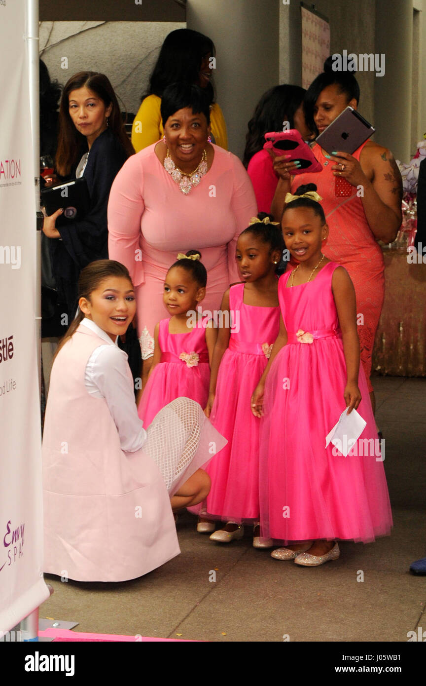Zendaya and 3 girls in pink dresses attend the 7th Annual Women of Excellence Awards on June 13, 2015 at the Luxe Hotel in Los Angeles, CA. Stock Photo
