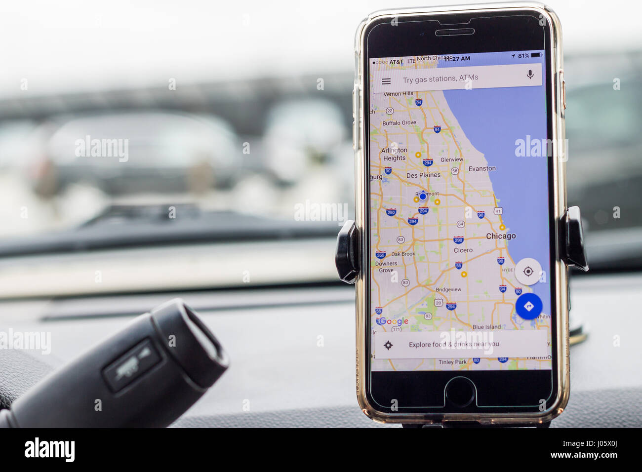 Chicago,IL,USA,Feb-21,2017,Smartphone attached to a car mount in car with Google map (for editorial use only) Stock Photo