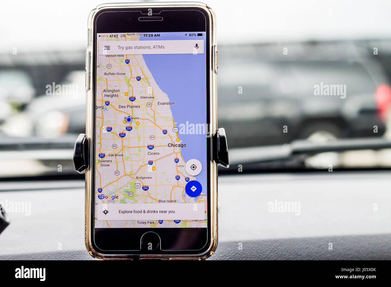 Chicago,IL,USA,Feb-21,2017,Smartphone attached to a car mount in car with Google map (for editorial use only) Stock Photo