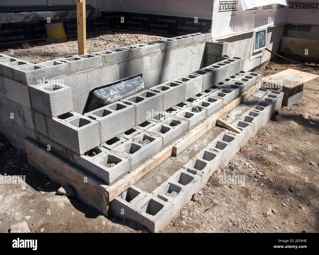 Cinder blocks used for a porch at a construction site Stock Photo