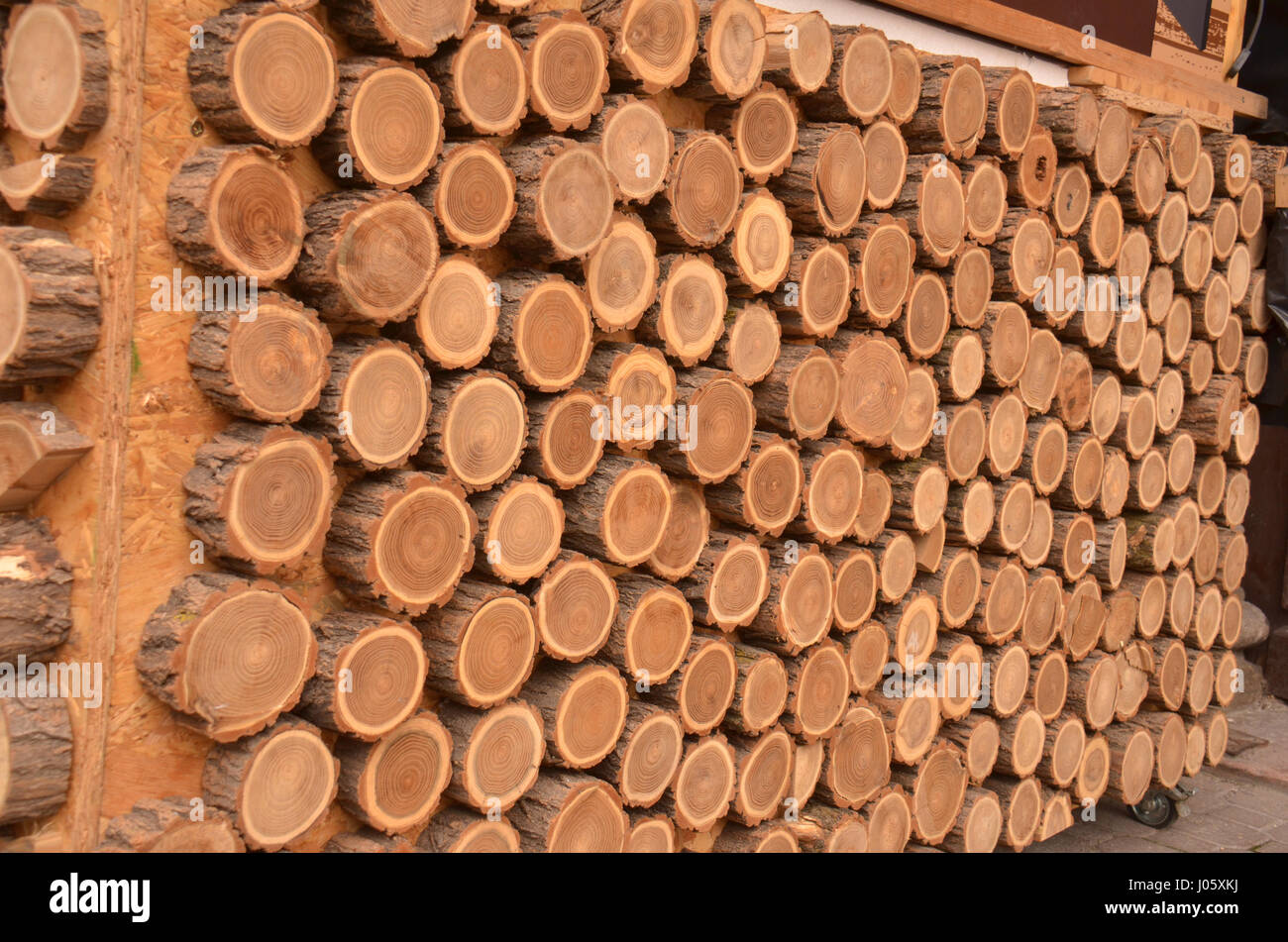 Decorative wall here using wooden logs on this market stall in ...