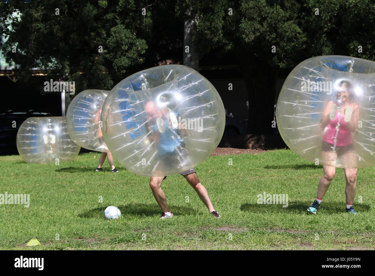 People play ‘bubble soccer’ or ‘bubble football’ at Wentworth Park
