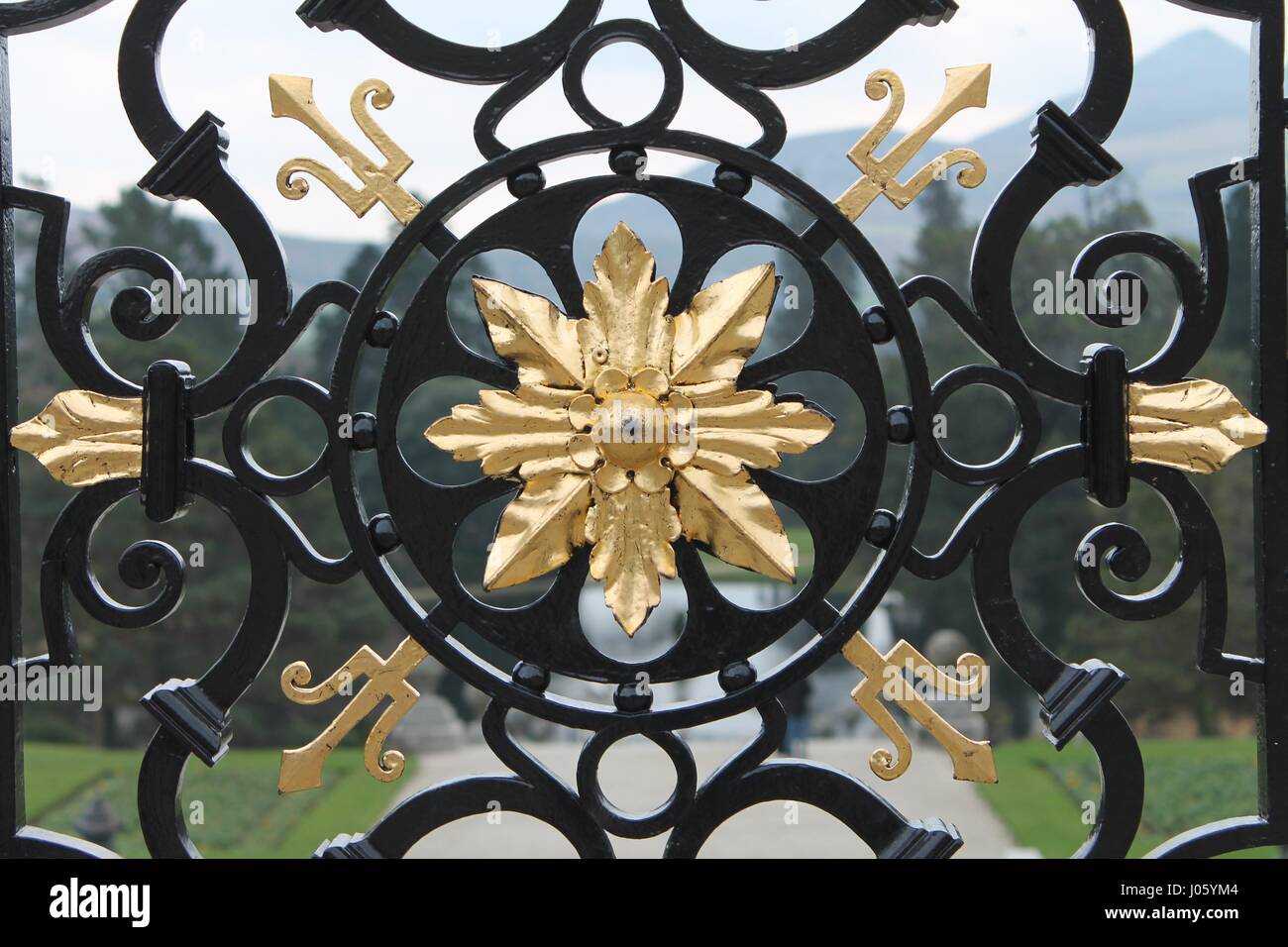 Black Iron and Gold Gate Stock Photo