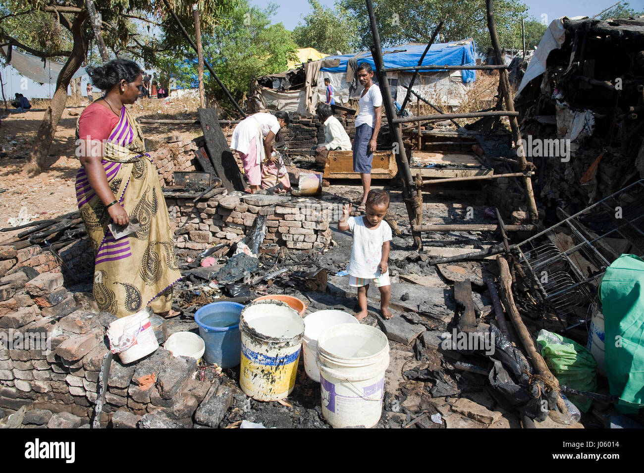 Damaged house after slum fire, damu nagar, kandivali, mumbai, maharashtra, india, asia Stock Photo