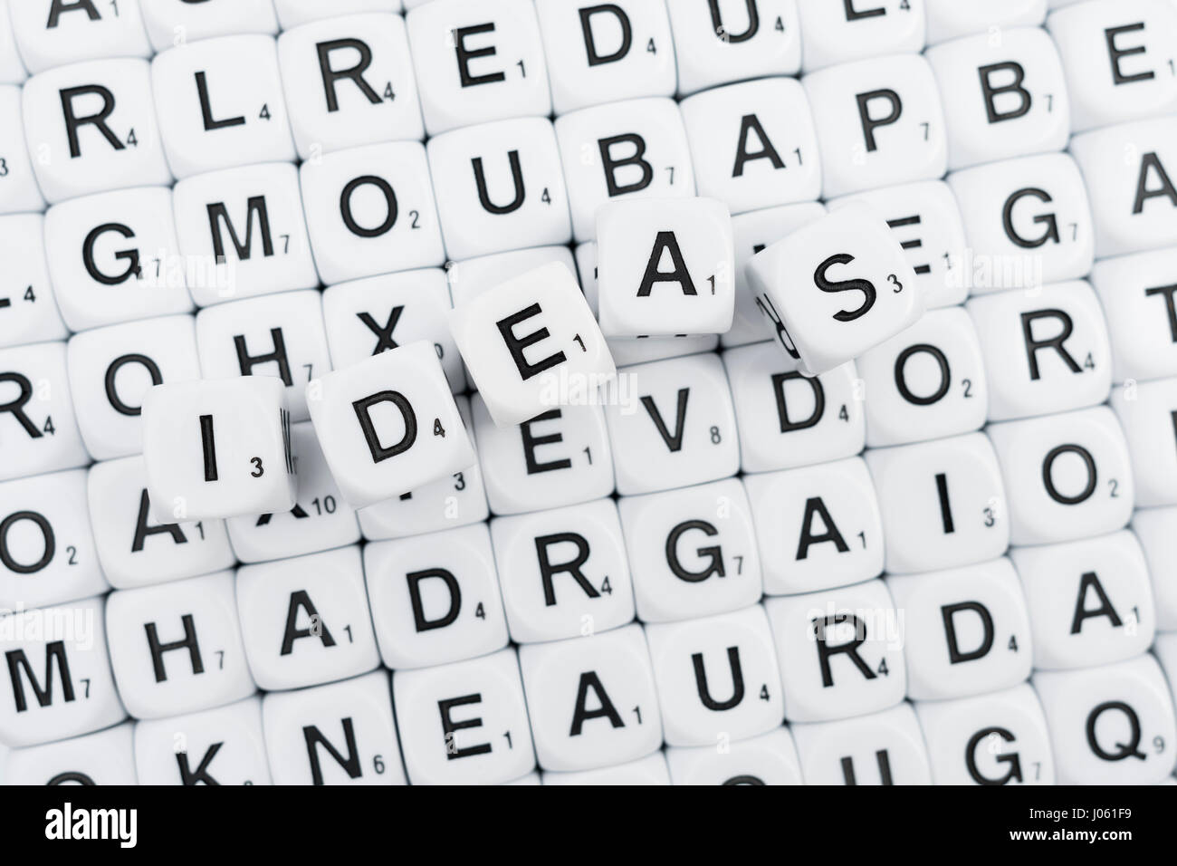 Alphabet dice / letter dice / scrabbletype dice, spelling out the word "Idea Stock Photo Alamy