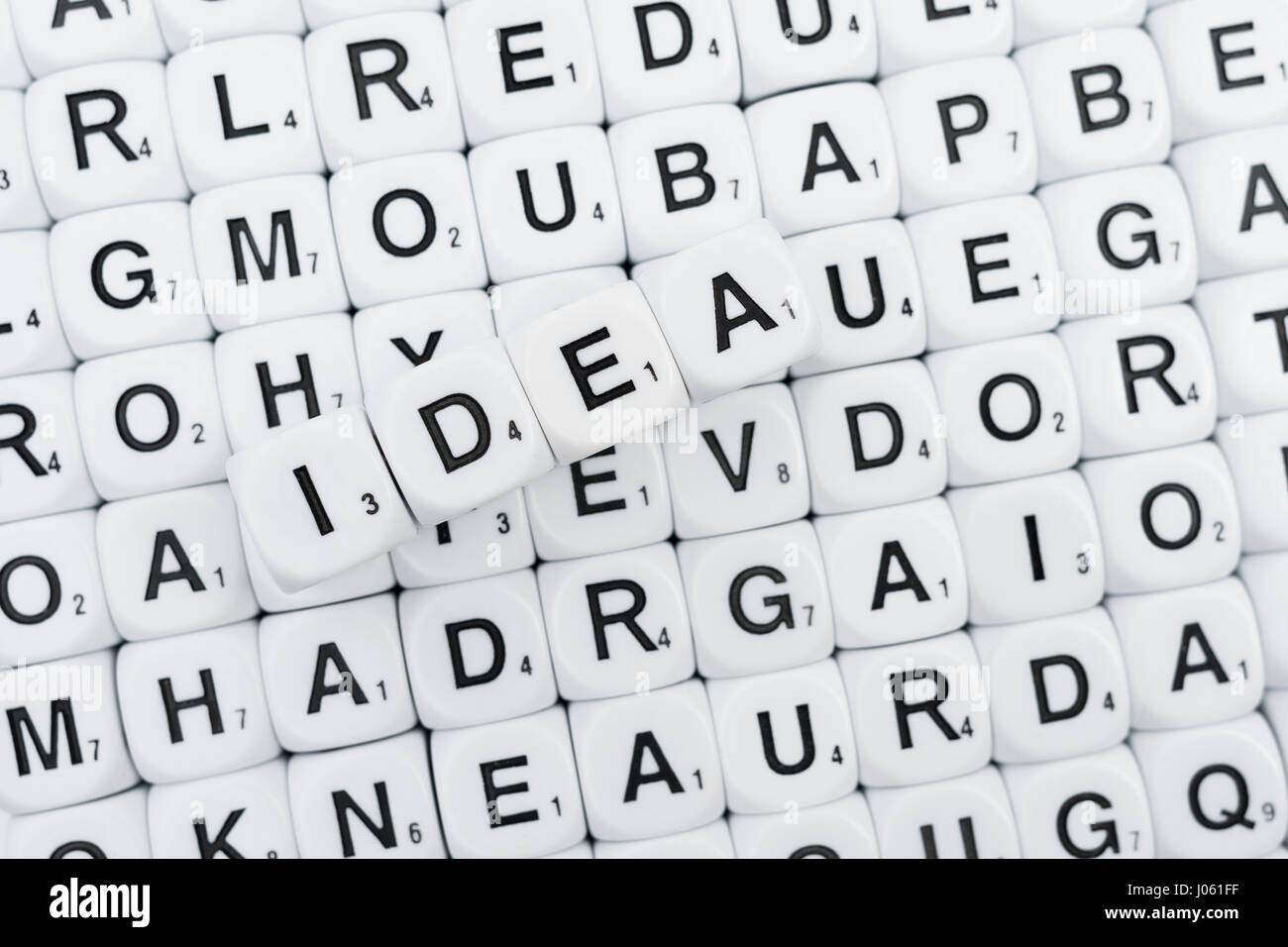 Alphabet dice / letter dice / scrabbletype dice, spelling out the word