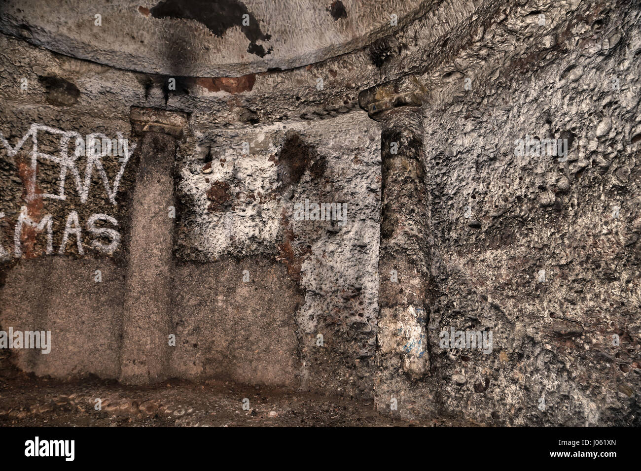 UNITED KINGDOM: EERIE images reveal the remains of a hidden 18th century underground pagan temple that might have been used for occult rituals and has been sealed and left to crumble away. The haunting shots show a series of underground passages, structural columns adorned with graffiti and rubble that has crumbled from the temple’s roof. Other atmospheric shots, from this location near Hagley in Worcestershire, show a roman style altar. The stunning photographs were taken by sales advisor, Jason Kirkham (44). To take his pictures, Jason used a Canon 5D Mark 3 camera. Jason Kirkham / mediadrum Stock Photo