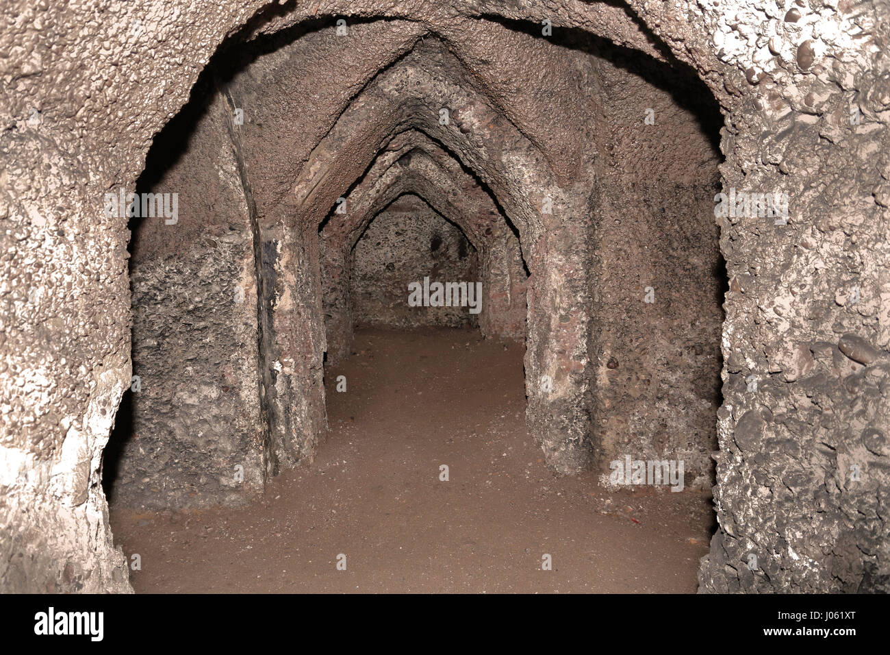 UNITED KINGDOM: EERIE images reveal the remains of a hidden 18th century underground pagan temple that might have been used for occult rituals and has been sealed and left to crumble away. The haunting shots show a series of underground passages, structural columns adorned with graffiti and rubble that has crumbled from the temple’s roof. Other atmospheric shots, from this location near Hagley in Worcestershire, show a roman style altar. The stunning photographs were taken by sales advisor, Jason Kirkham (44). To take his pictures, Jason used a Canon 5D Mark 3 camera. Jason Kirkham / mediadrum Stock Photo