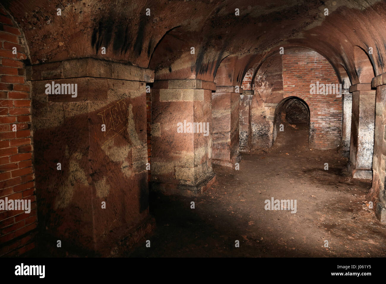 UNITED KINGDOM: EERIE images reveal the remains of a hidden 18th century underground pagan temple that might have been used for occult rituals and has been sealed and left to crumble away. The haunting shots show a series of underground passages, structural columns adorned with graffiti and rubble that has crumbled from the temple’s roof. Other atmospheric shots, from this location near Hagley in Worcestershire, show a roman style altar. The stunning photographs were taken by sales advisor, Jason Kirkham (44). To take his pictures, Jason used a Canon 5D Mark 3 camera. Jason Kirkham / mediadrum Stock Photo