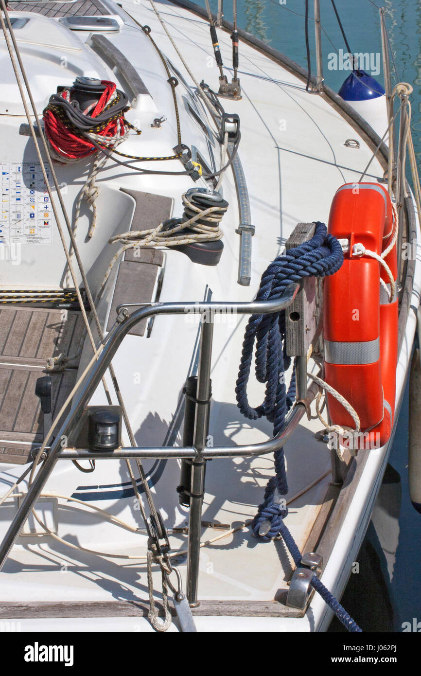 Sailing boat equipped with lifeline and ropes Stock Photo Alamy