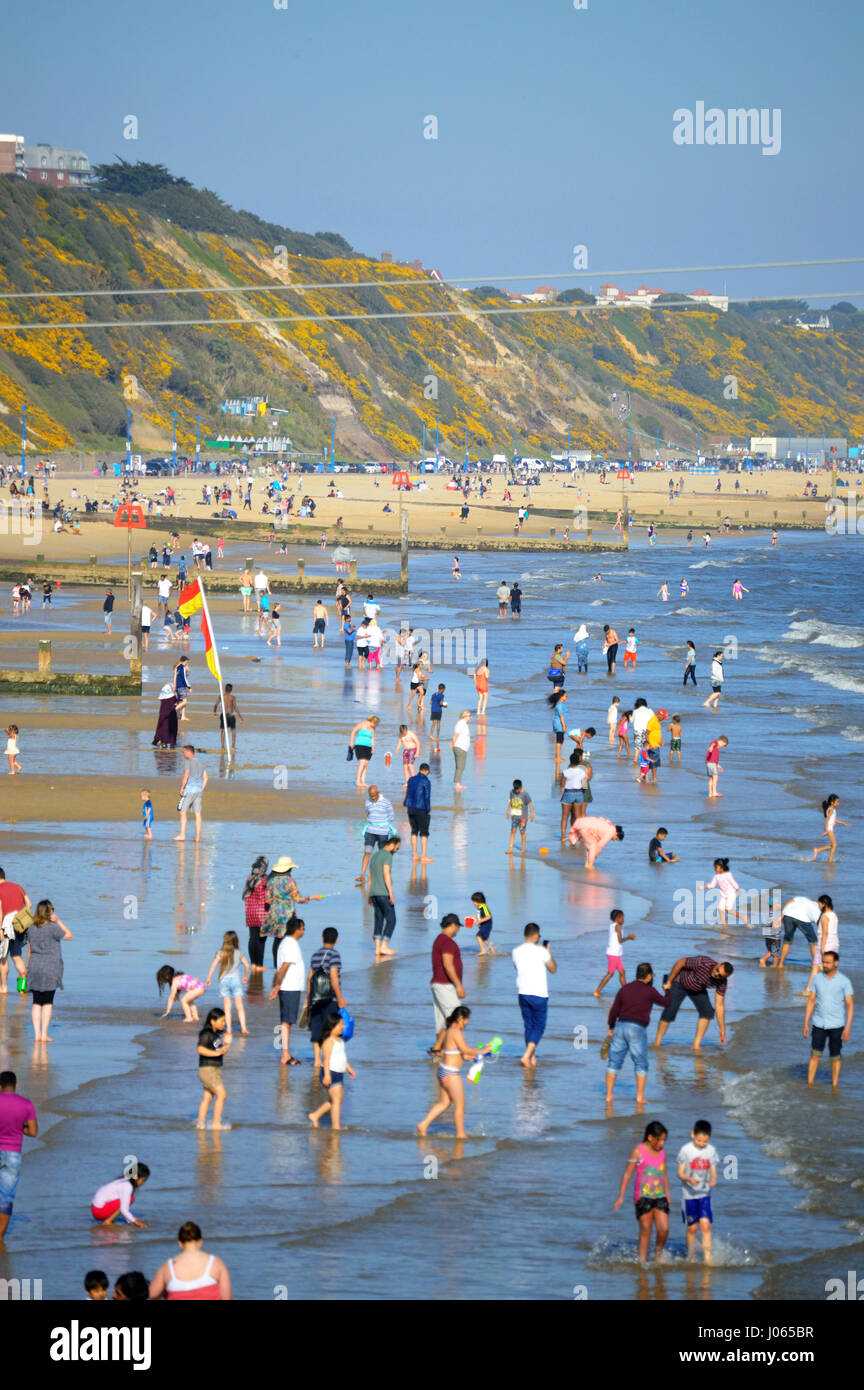 Crowded beach in Bournemouth on a warm spring day, Bournemouth, Dorset, UK Stock Photo